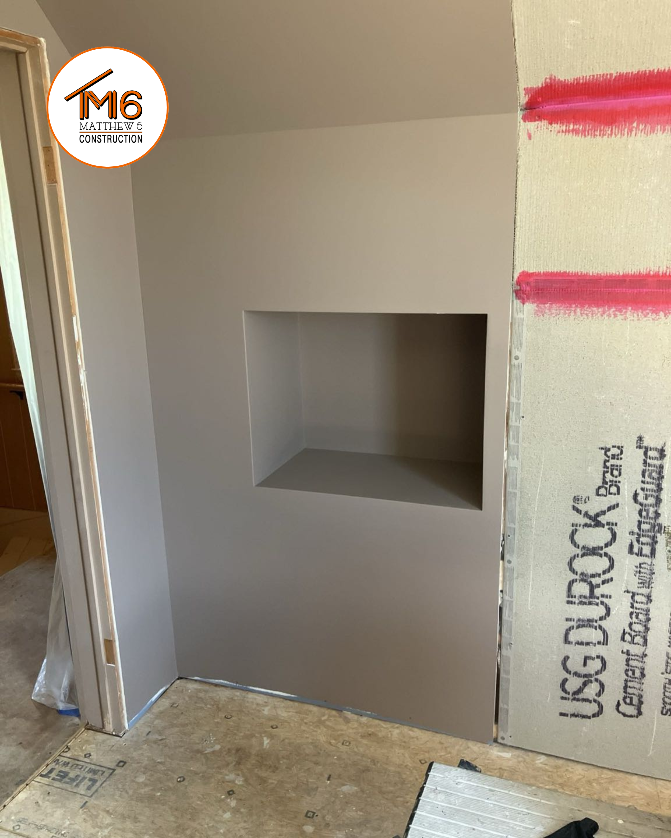 Schwamberger_Bathroom_Matthew6Construction_LudingtonMI_M6logo (10).png