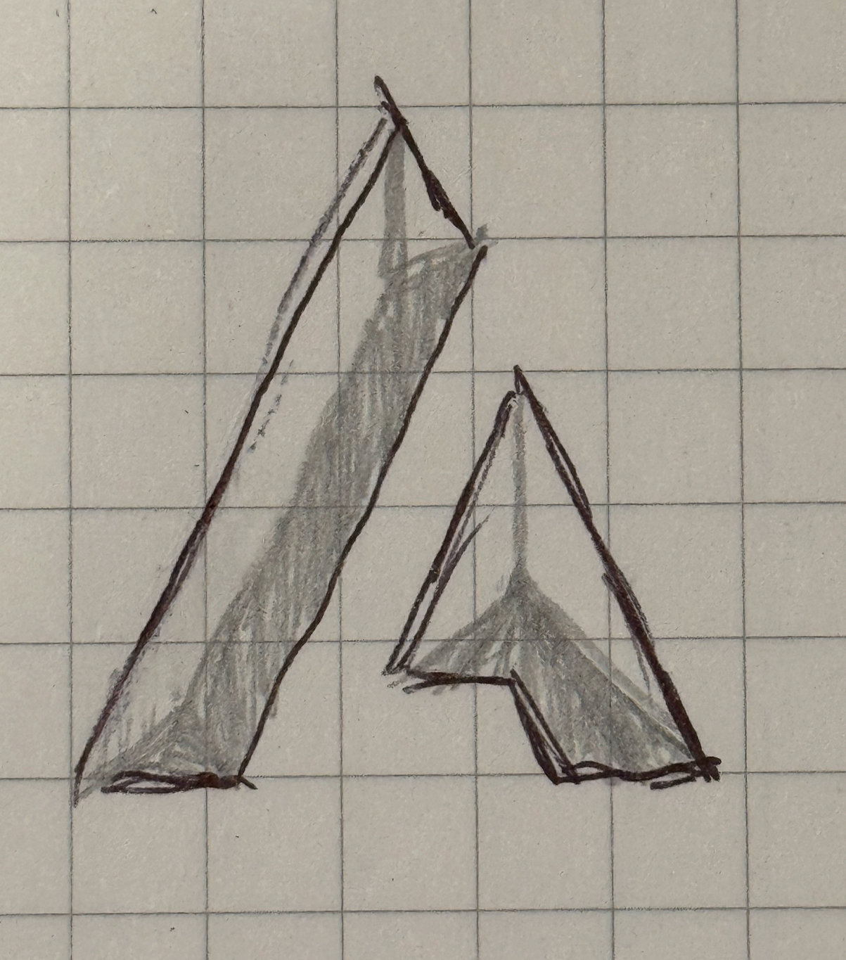 Hand-drawn sketch of the letter A with shading and three-dimensional effect on graph paper.