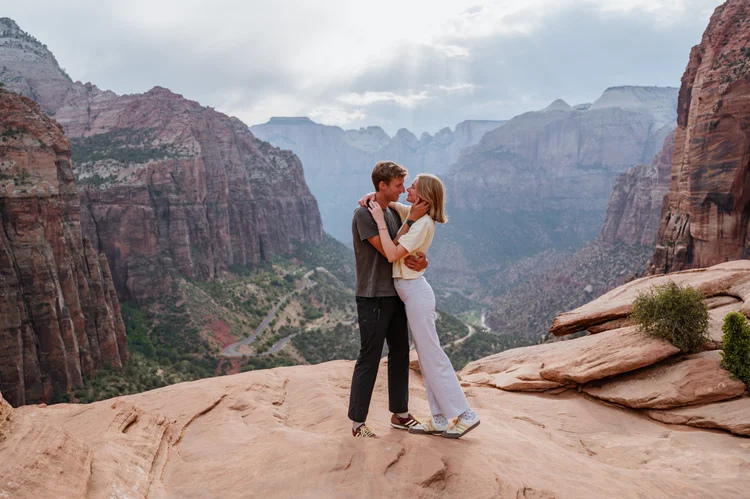 Couple sharing first kiss during elopement ceremony at Zion National Park Utah