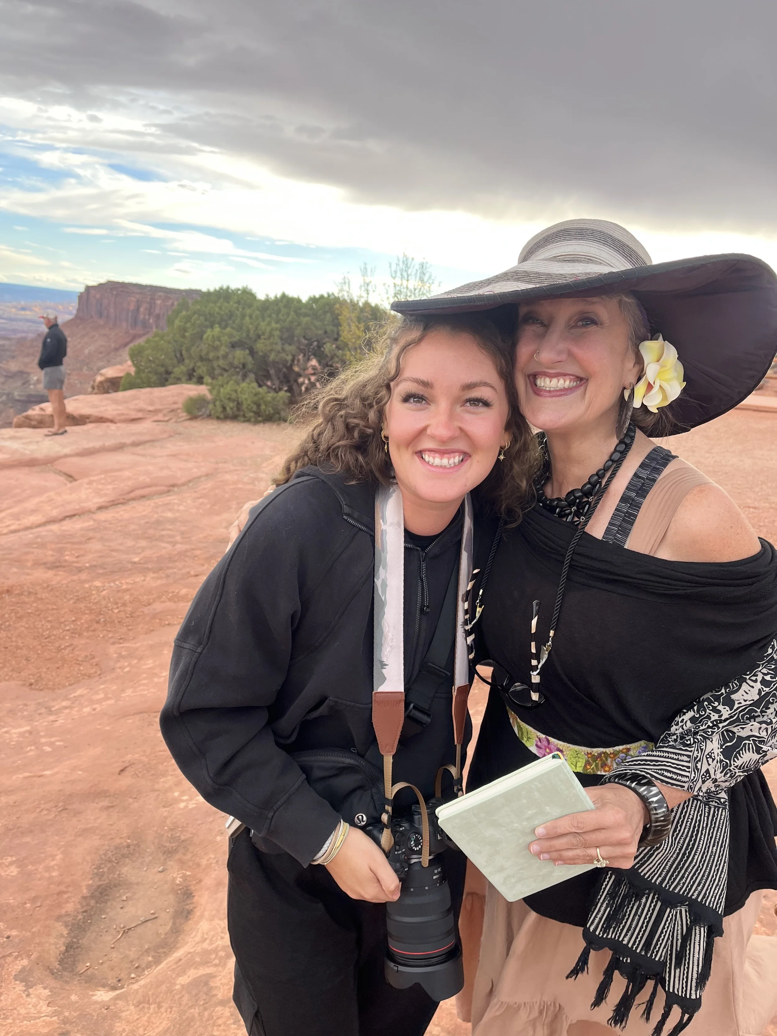 Elopement photographer and client at Moab Utah canyon location