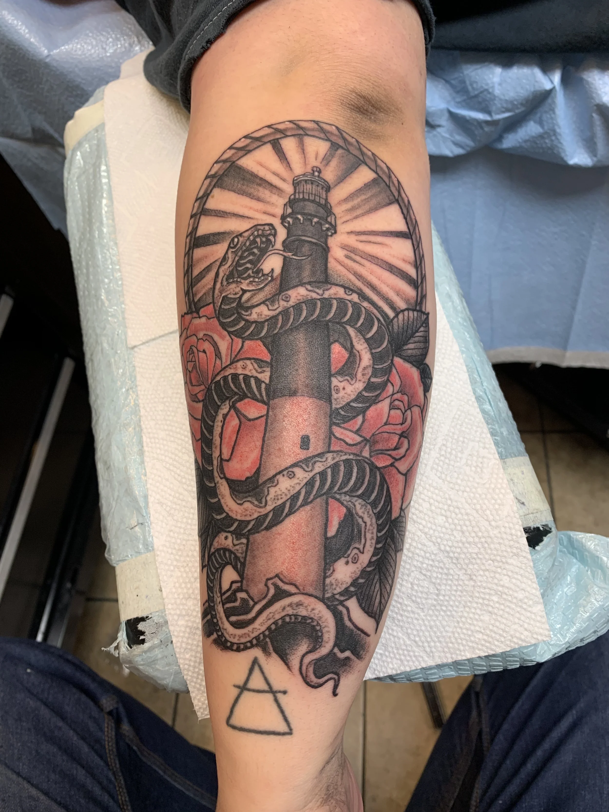lighthouse snake color tattoo