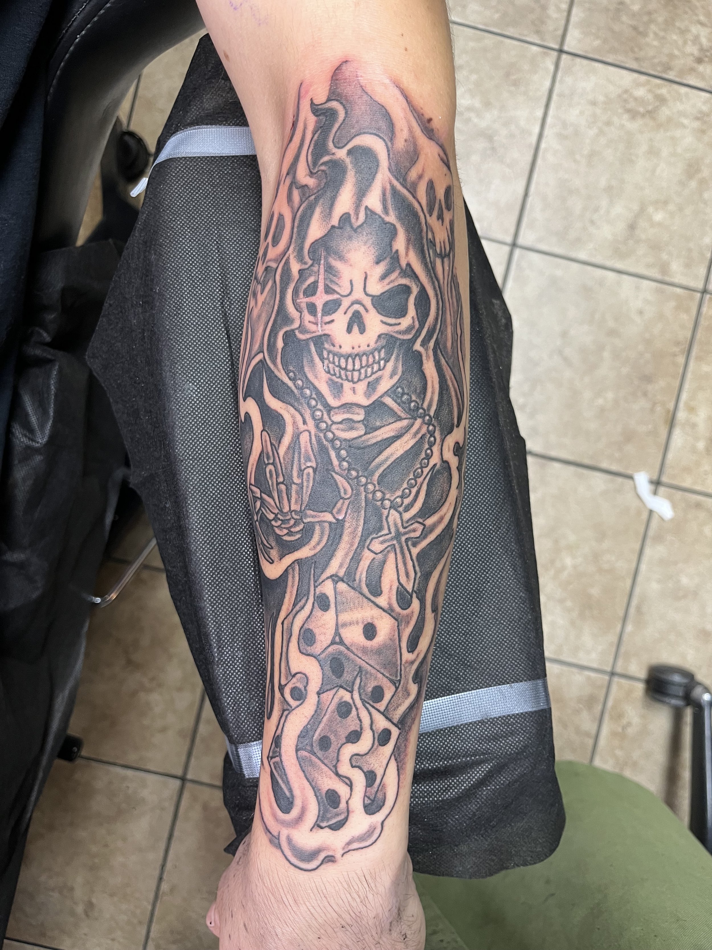 reaper dice flames tattoo