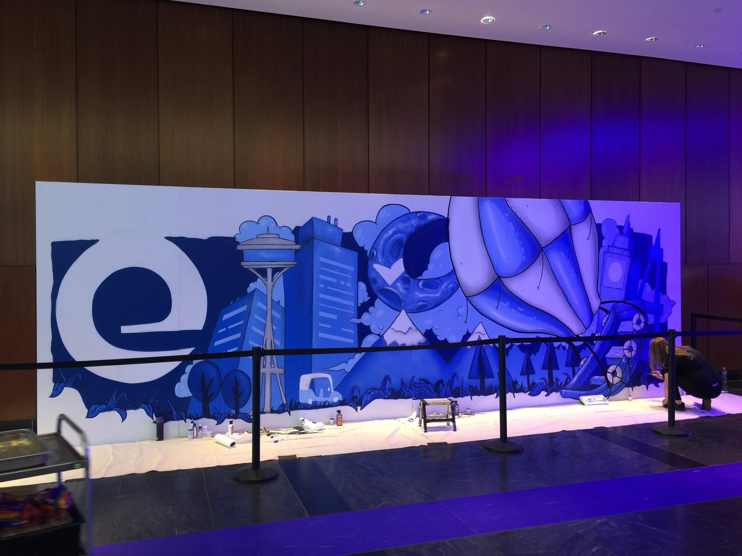 Expedia headquarters live painted mural installation in Seattle WA. 2018