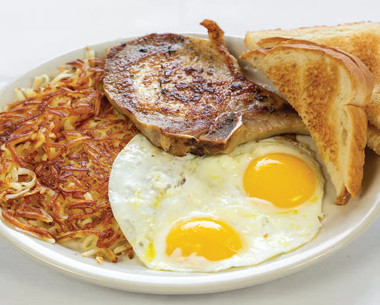Pork Chop and
Two Egg Breakfast at Redwood Cafe