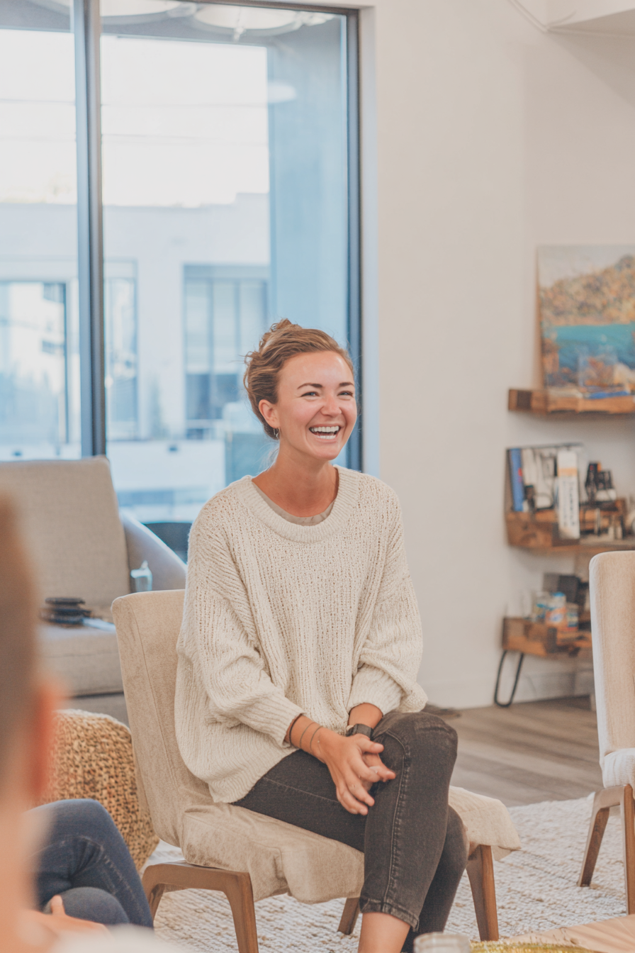 Therapist smiling portrait on website for a practice branding expert.