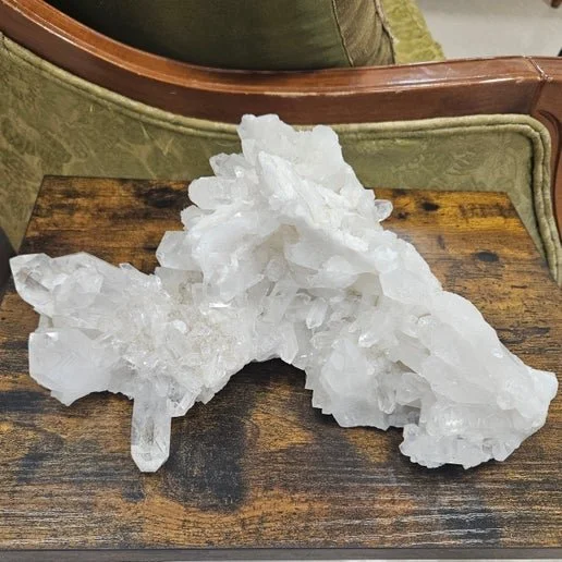 Clear Quartz crystal showing transparent, luminous formations with natural facets and a bright, cleansing appearance.