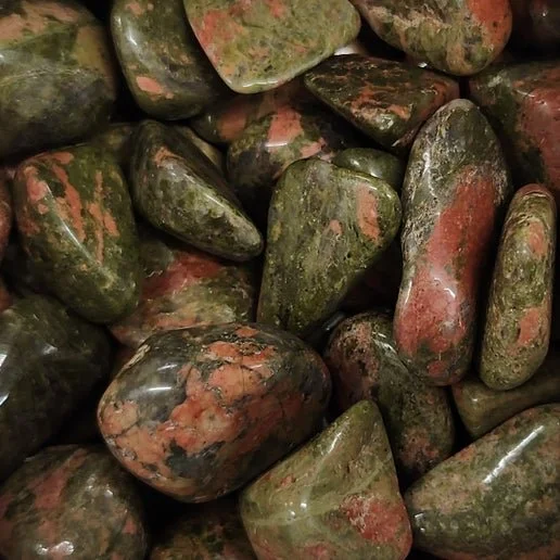 Pink and green Unakite stone with mottled patterns, polished and tumbled.
