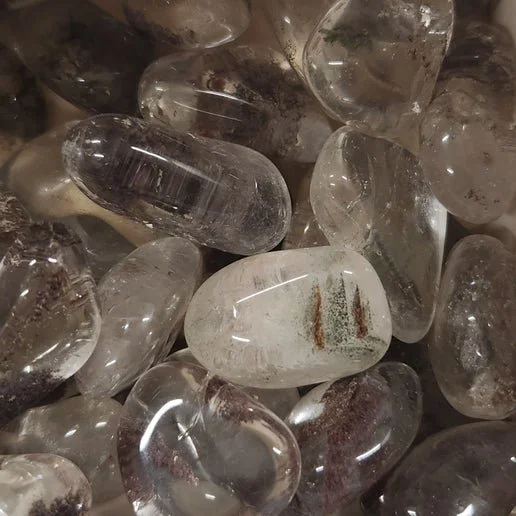 Garden Quartz crystal with natural moss-like and scenic mineral inclusions visible within clear quartz.