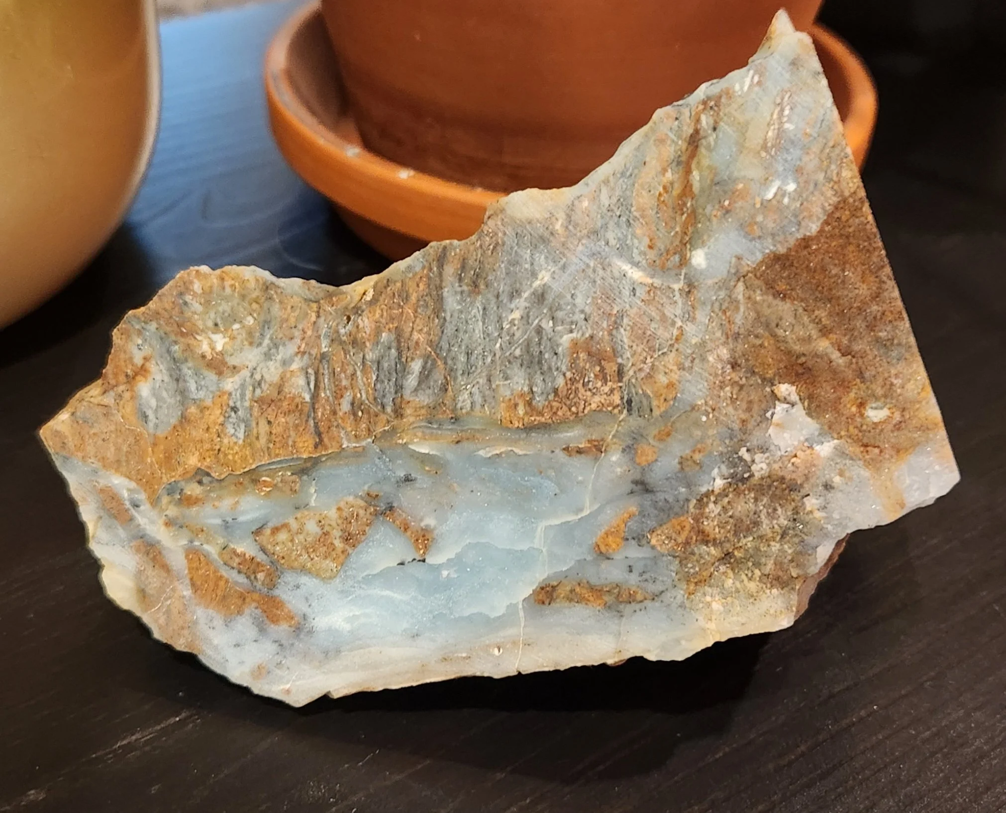 A BC Ocean Picture Jasper with earthy brown, cream, and ocean-blue patterns, polished smooth.