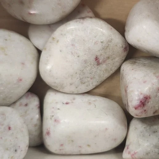 Cinnabarite crystal showing vivid red mercury sulphide formations on a contrasting natural matrix.
