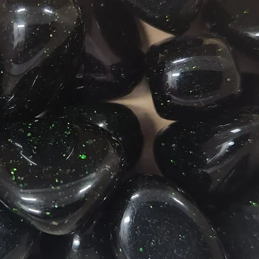 Green Goldstone polished stone showing soft green glass with subtle copper sparkle throughout.