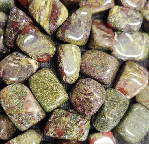 Dragon’s Blood Jasper stone showing deep green colouring with natural dark red and brown patterns.