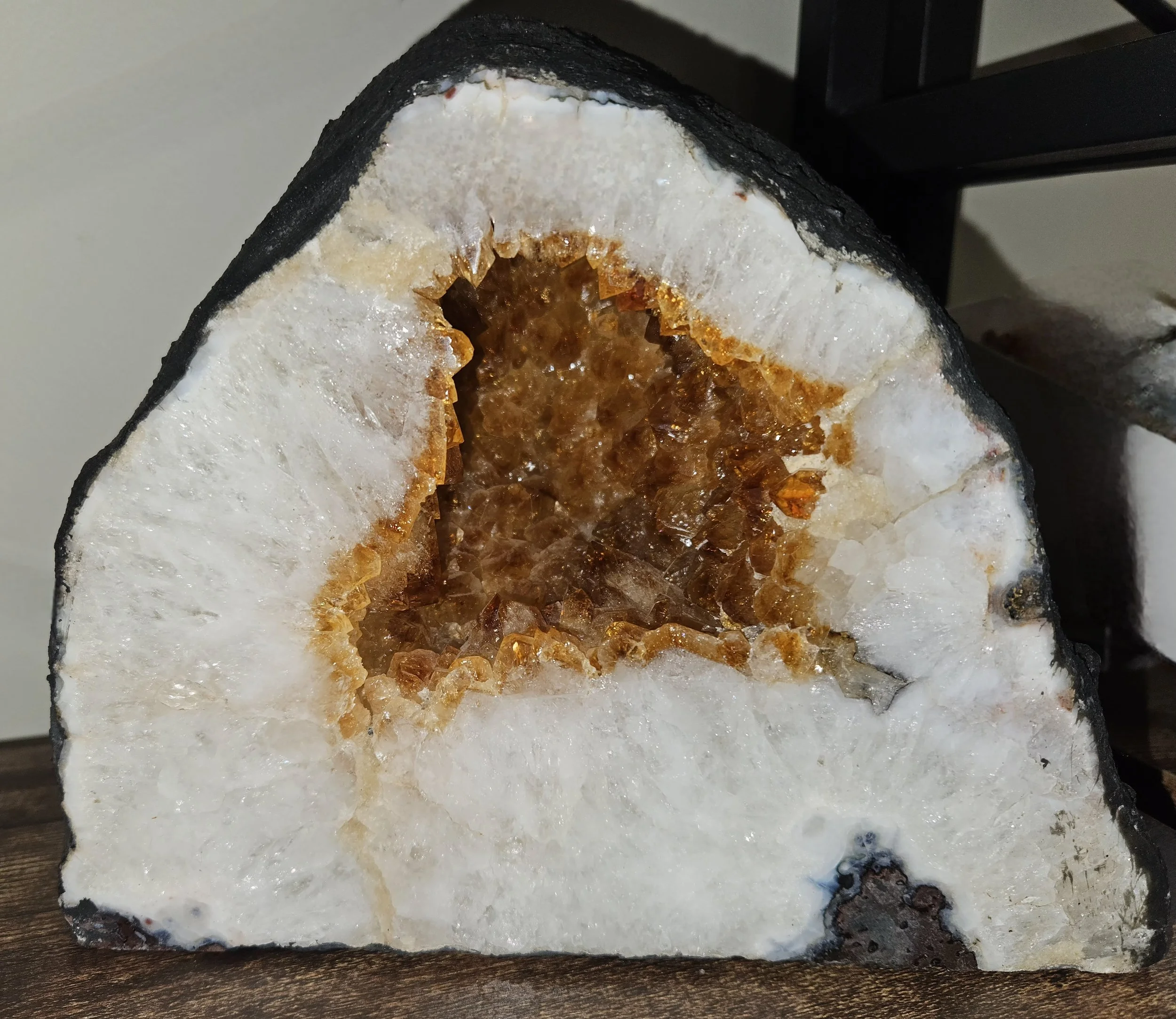 Citrine crystal displaying warm golden-yellow tones with a natural translucent glow and bright, uplifting appearance.