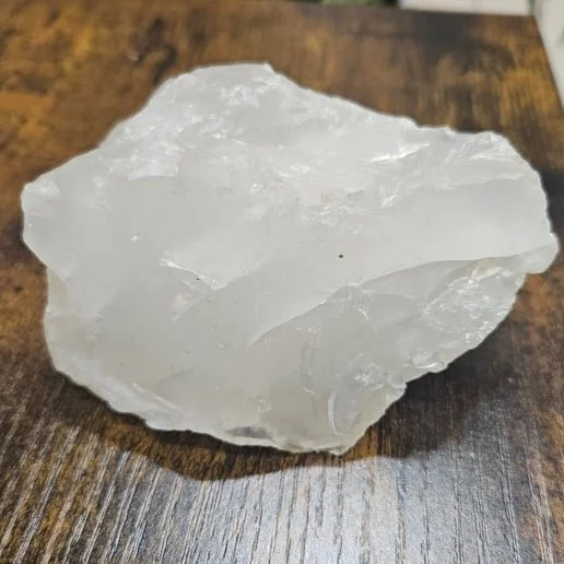 Girasol Quartz crystal with a soft milky, opalescent glow and smooth natural surface.