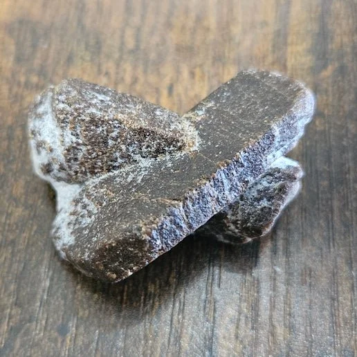 Natural Staurolite crystal showing distinctive cross-shaped formation known as the Fairy Cross.