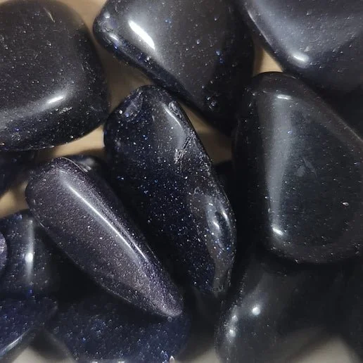 Blue Goldstone polished stone showing deep navy-blue glass with fine copper sparkle throughout.