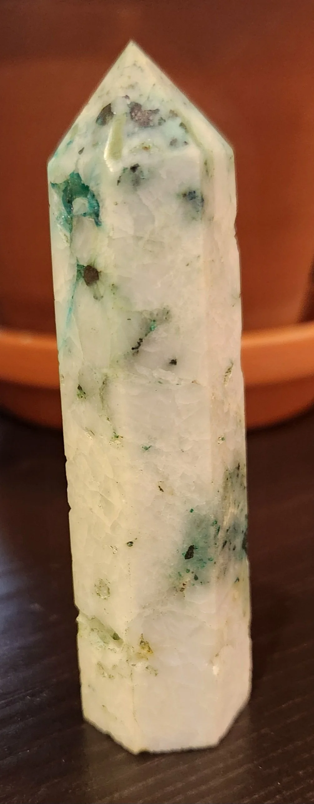 Blue and green Phoenix Stone with natural swirls of chrysocolla, malachite, and cuprite in rough form.