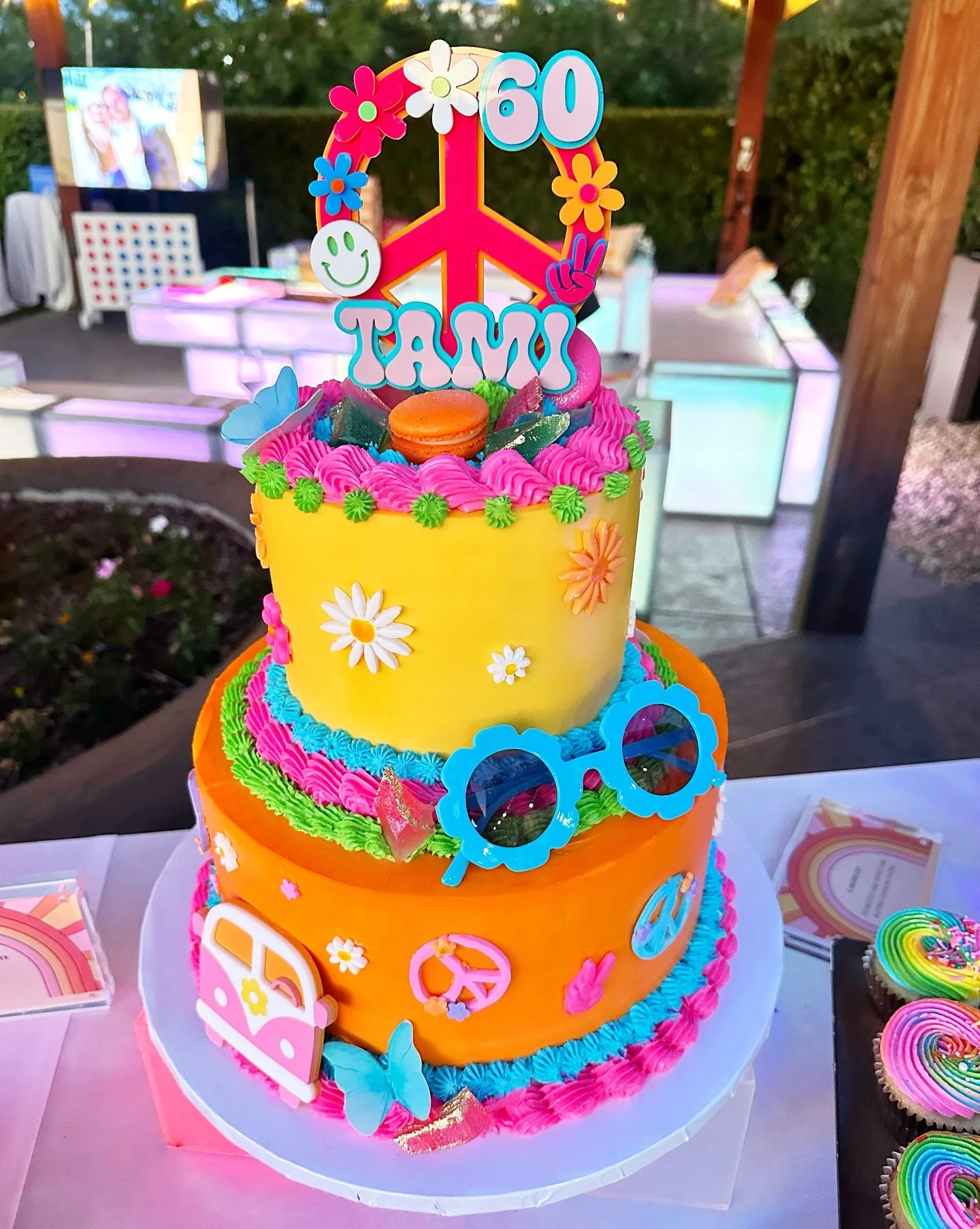 Peace, love and buttercream 💛✌️🌈 ⁣
⁣
⁣
⁣
⁣
⁣
⁣
⁣
⁣
⁣
⁣
⁣
⁣
⁣
#GroovyCake #60thBirthdayCake #PeaceAndCake #RetroPartyVibes #FlowerPowerCake #ButtercreamDreams #CustomCakesLA #SoCalBaker #NeonCake #EdibleArt #ColorfulCakes #HippieParty #60sThemeCake 