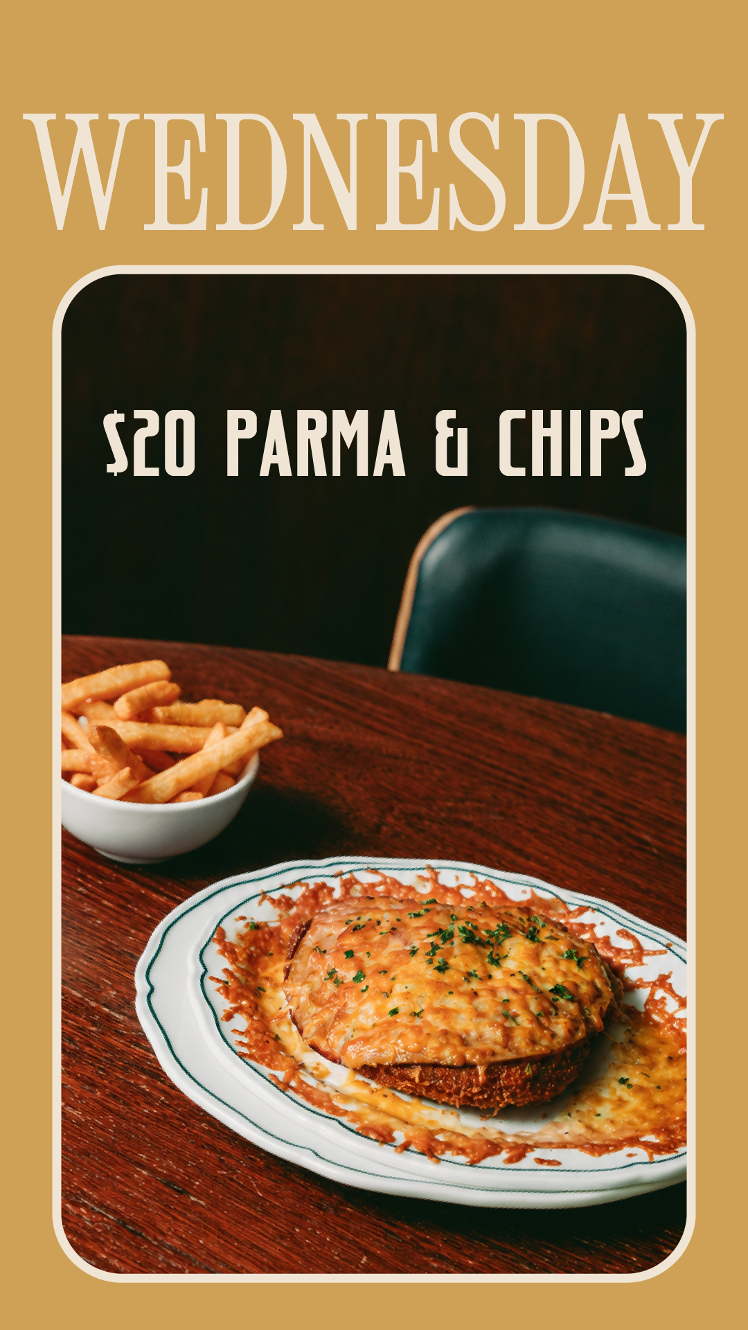 A plate of chicken parmesan with melted cheese, a bowl of French fries, and a side of marinara sauce on a wooden table.