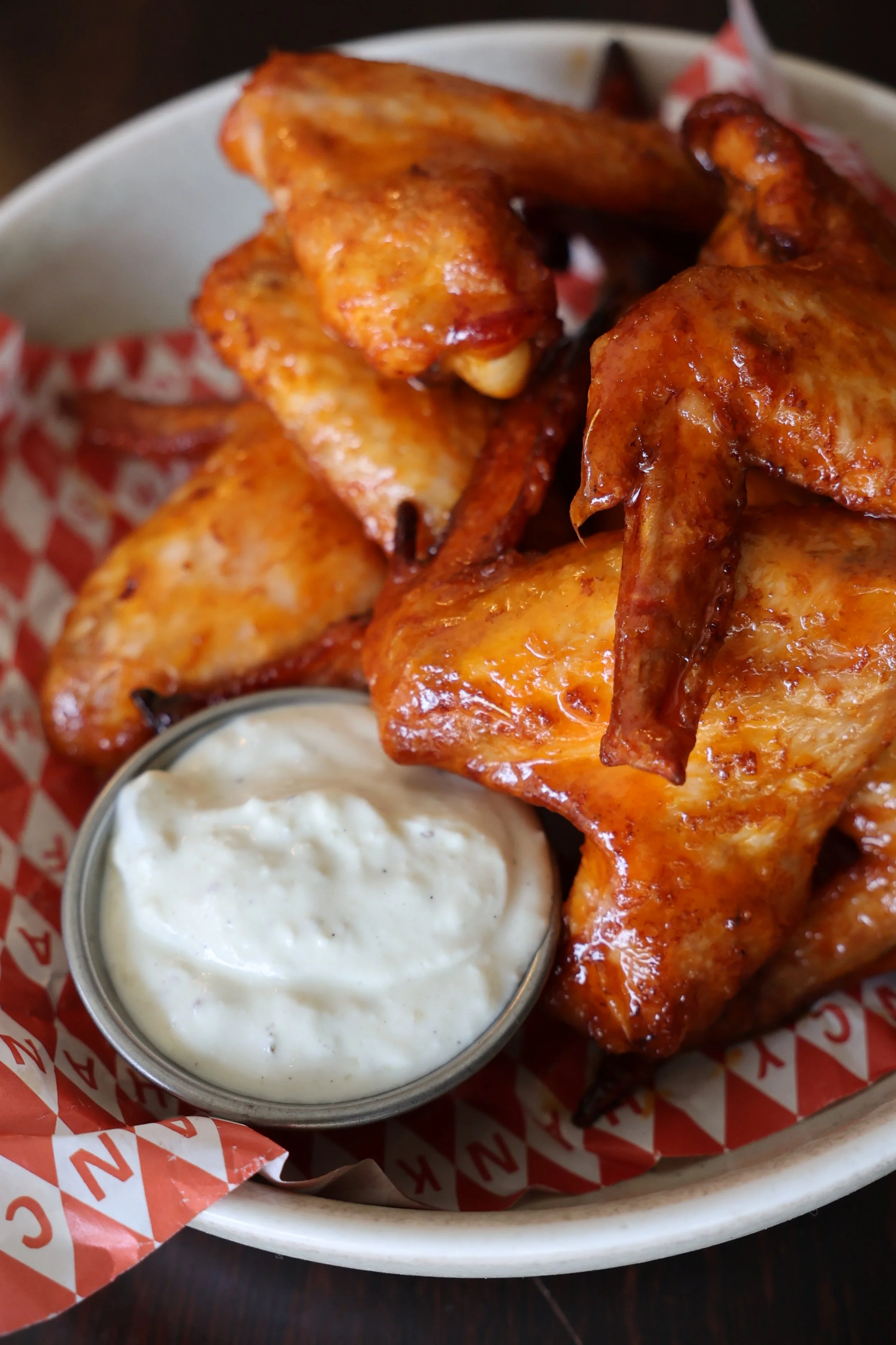 Bottomless buffalo wings with ranch at Springrock Public Bar