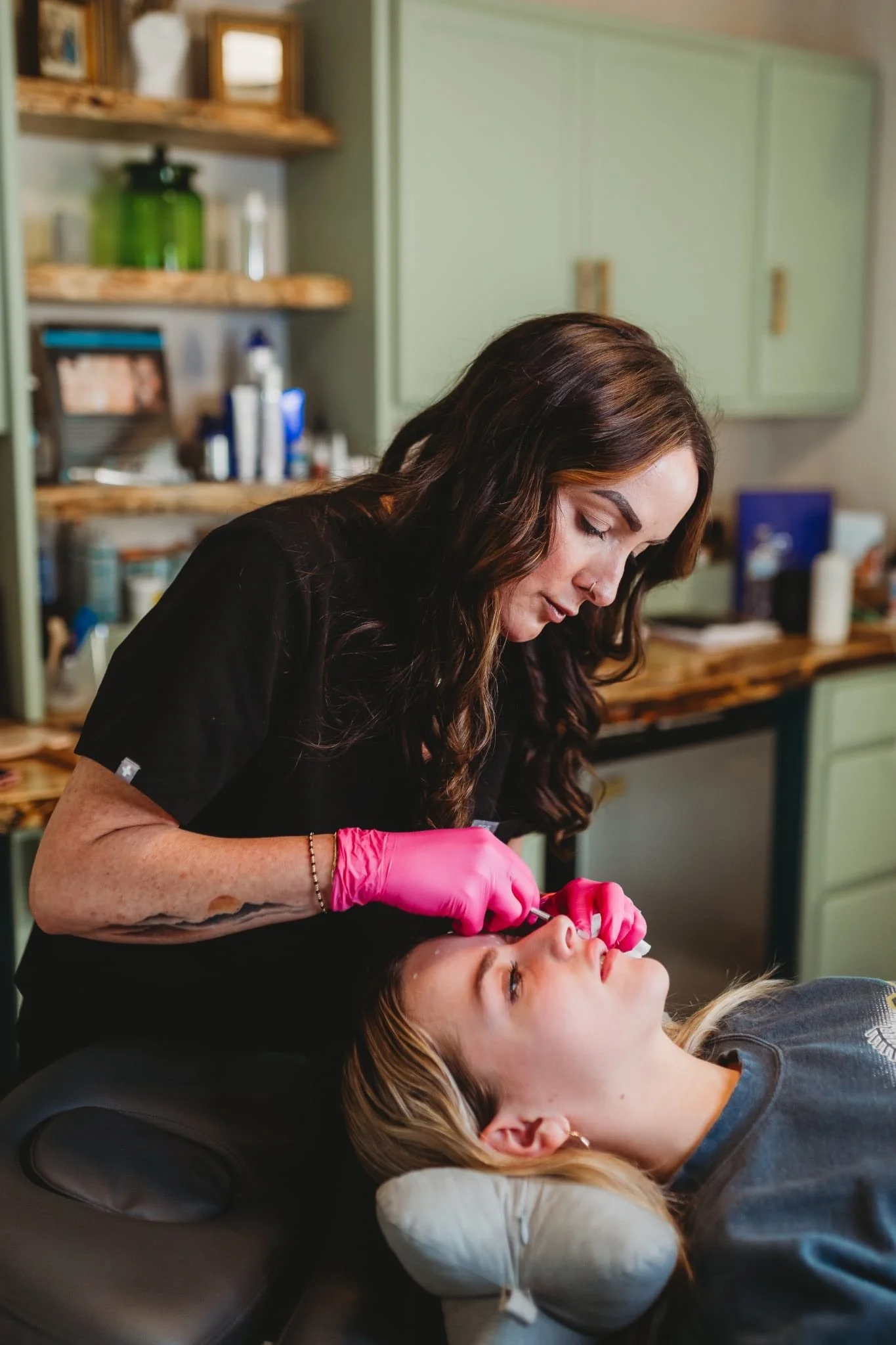 Natalie Hollis administering Botox injections at The Collective Med Spa in Tennessee, known for expert injectables, natural results, and personalized care