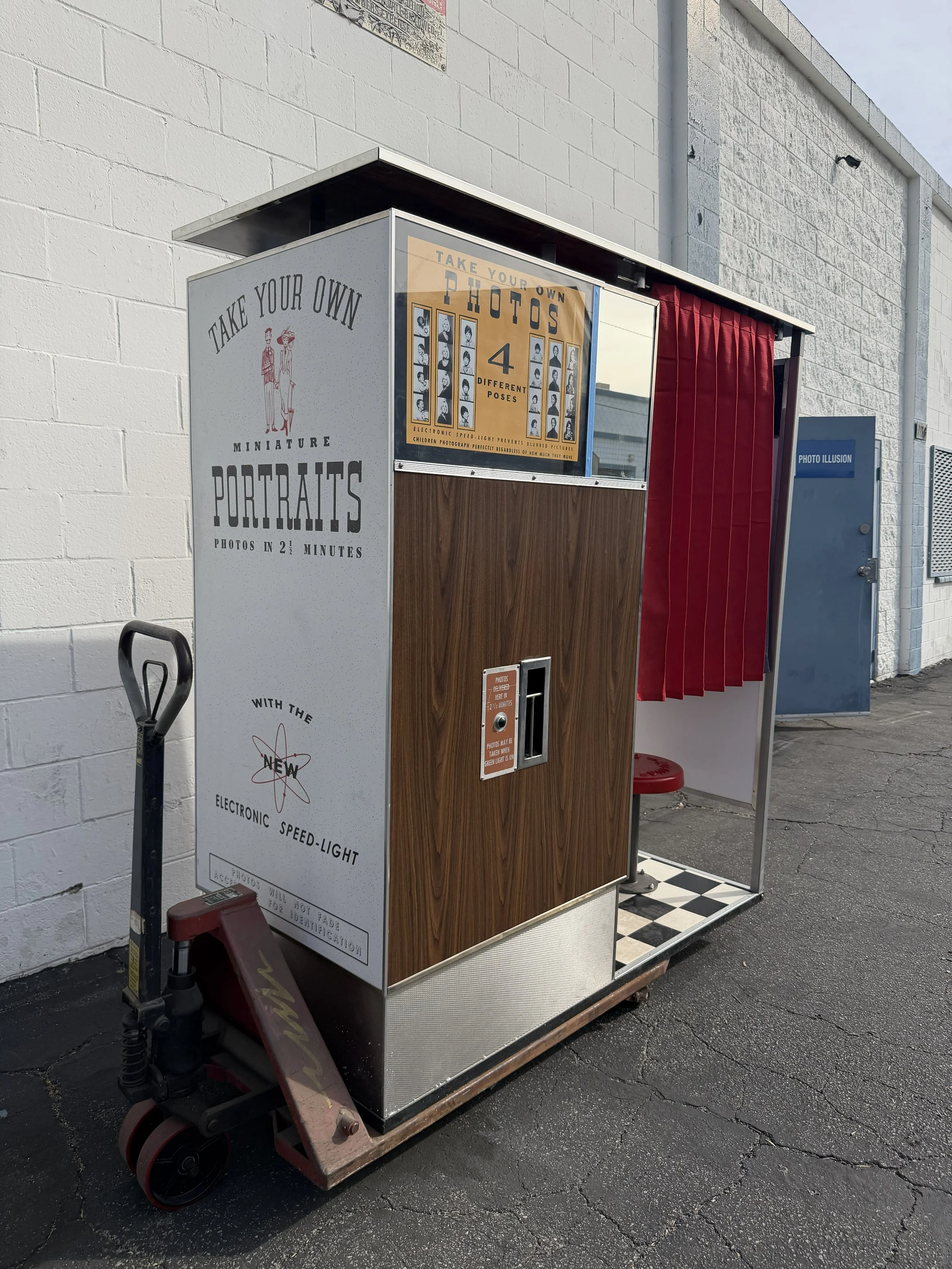 Fully restored Model 14 vintage analog photo booth. On a pallet jack.