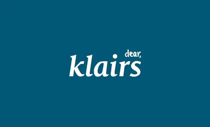 A teal background with white text reading "dear, klairs" in a stylized font.