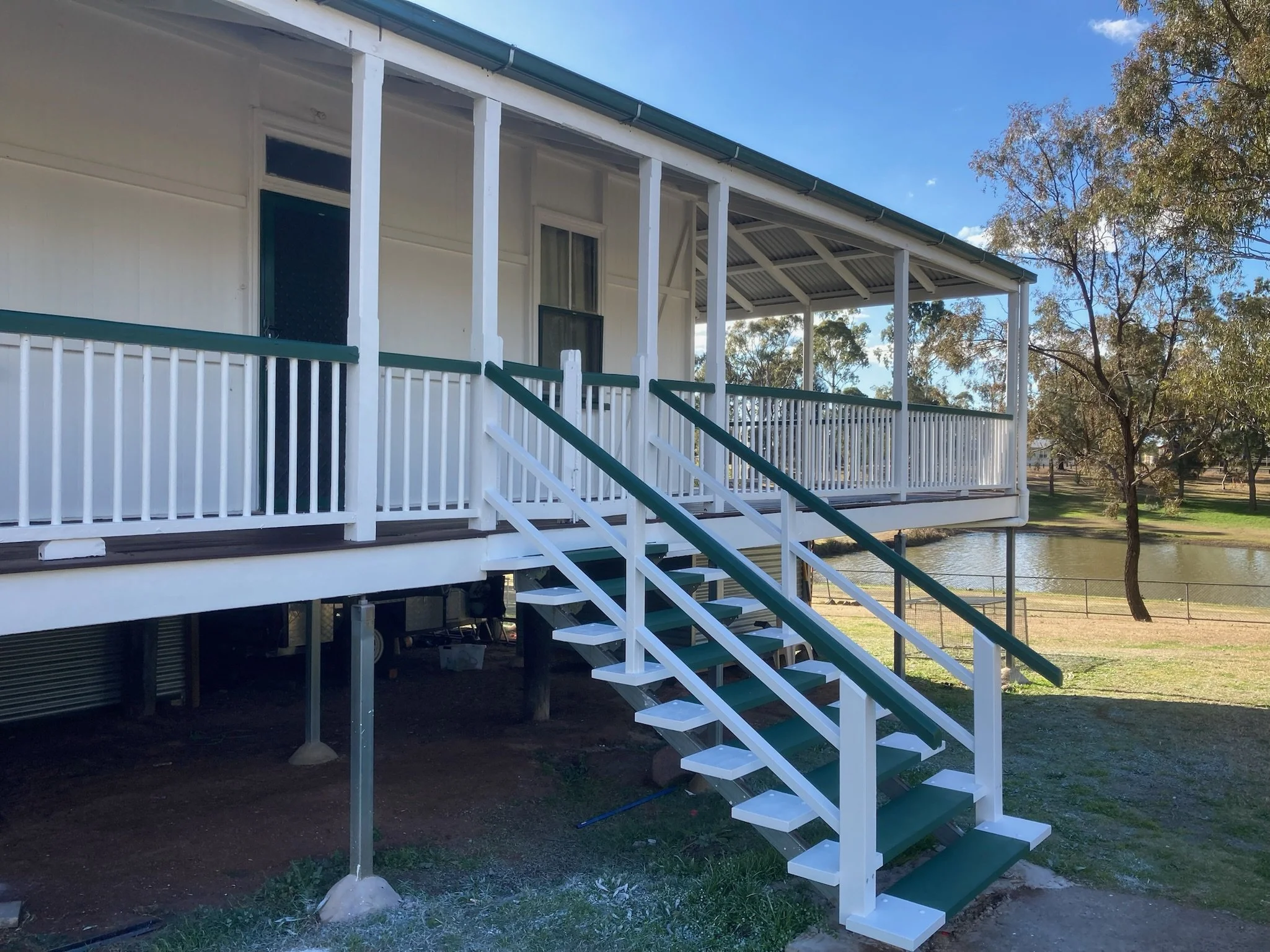 painted outdoor staircase on house