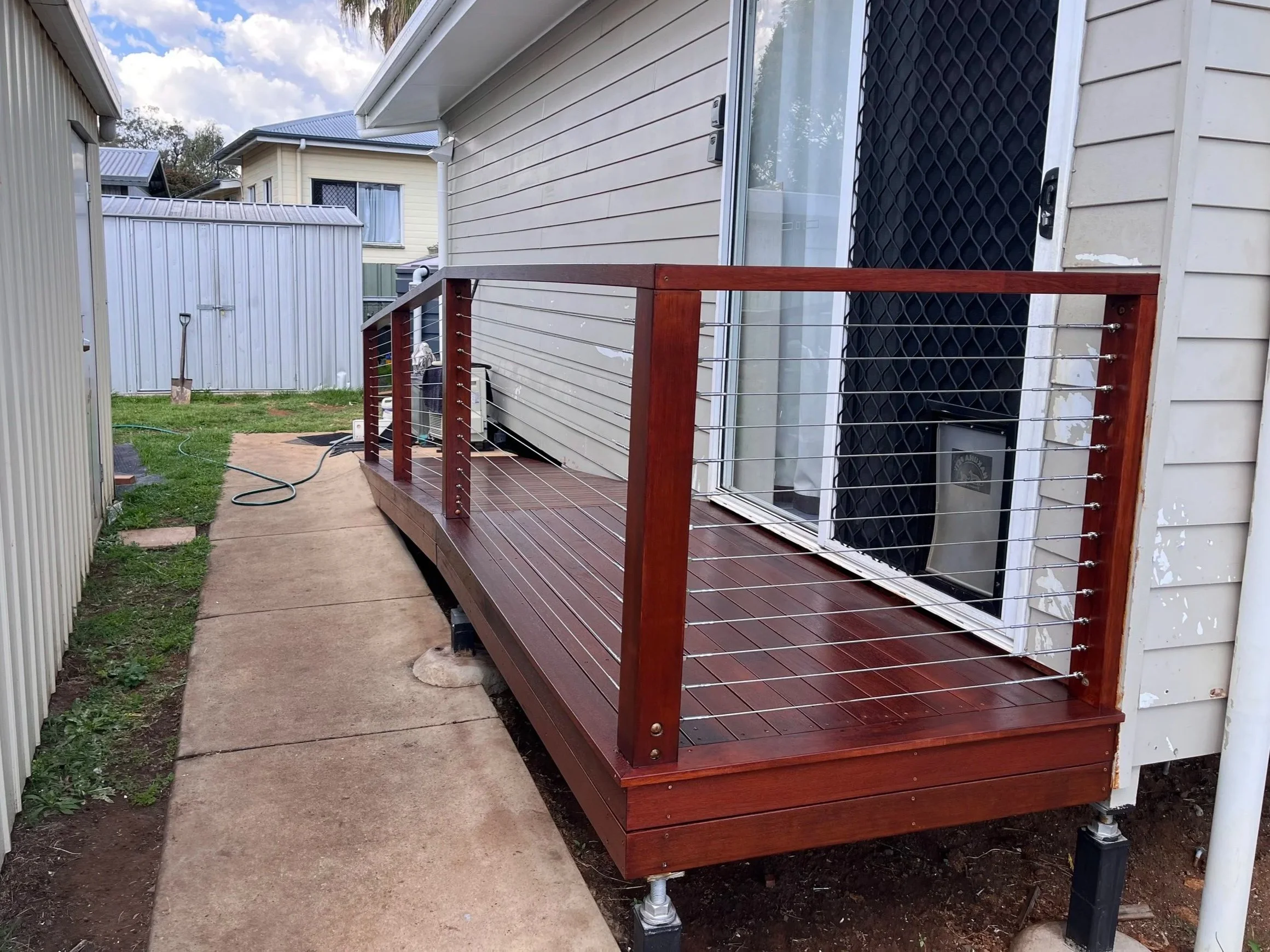 safety access ramp with handrails made from merbau timber