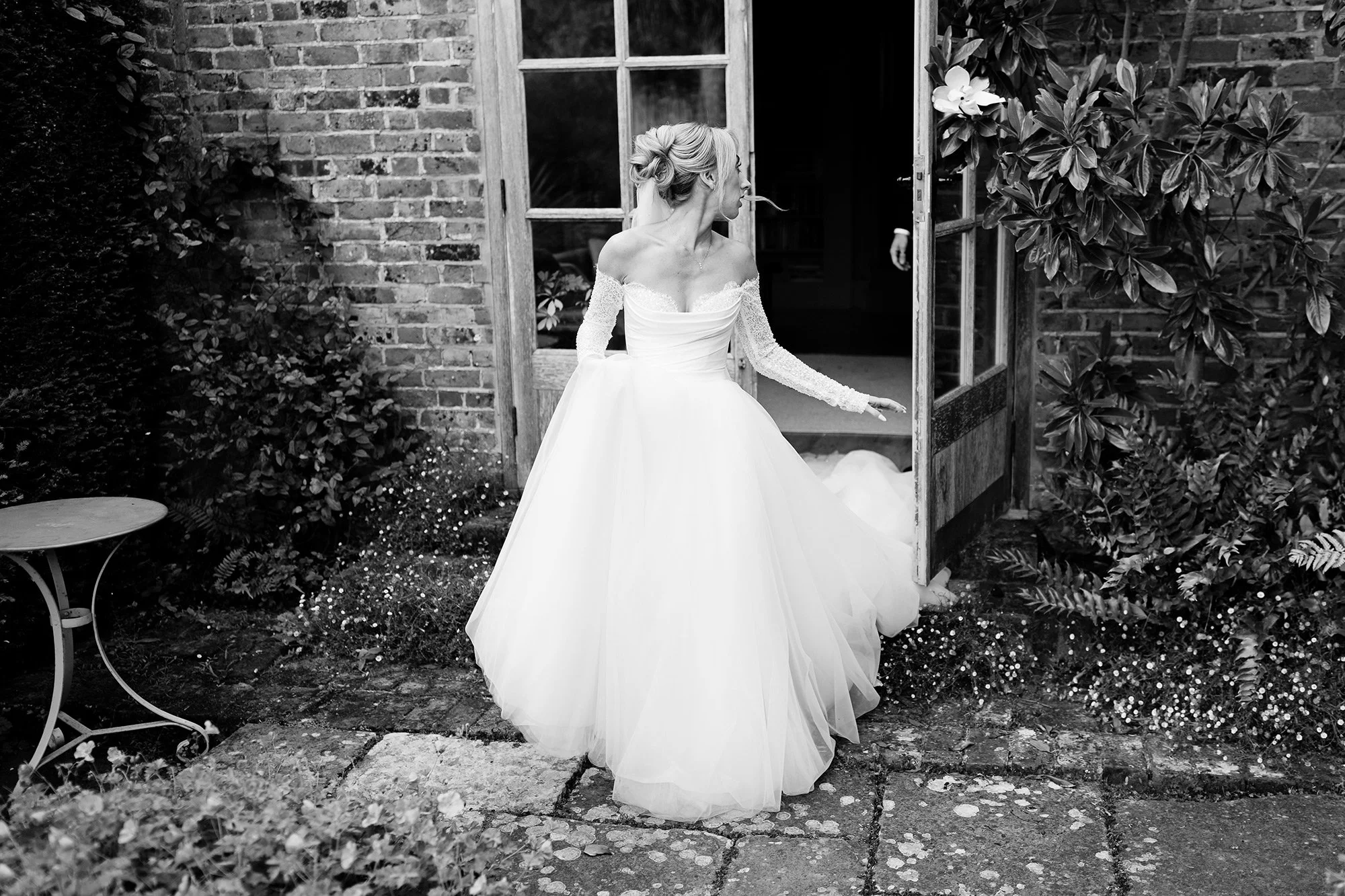 bride walking at chapel house estate wedding