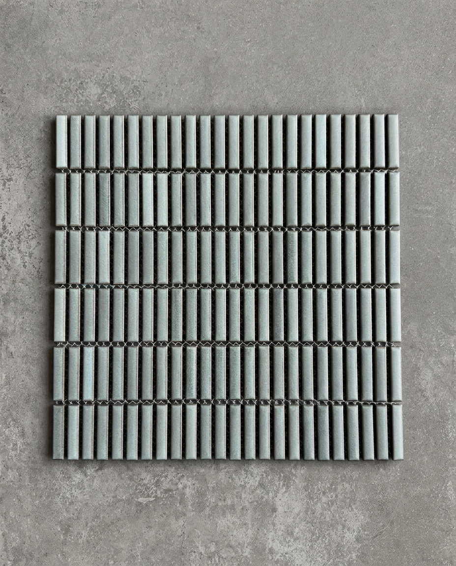 CHIBI Sage is a handcrafted Japanese mosaic stick tile with softly variegated glazes and refined texture, designed to bring depth, detail, and tactile character to contemporary interiors.