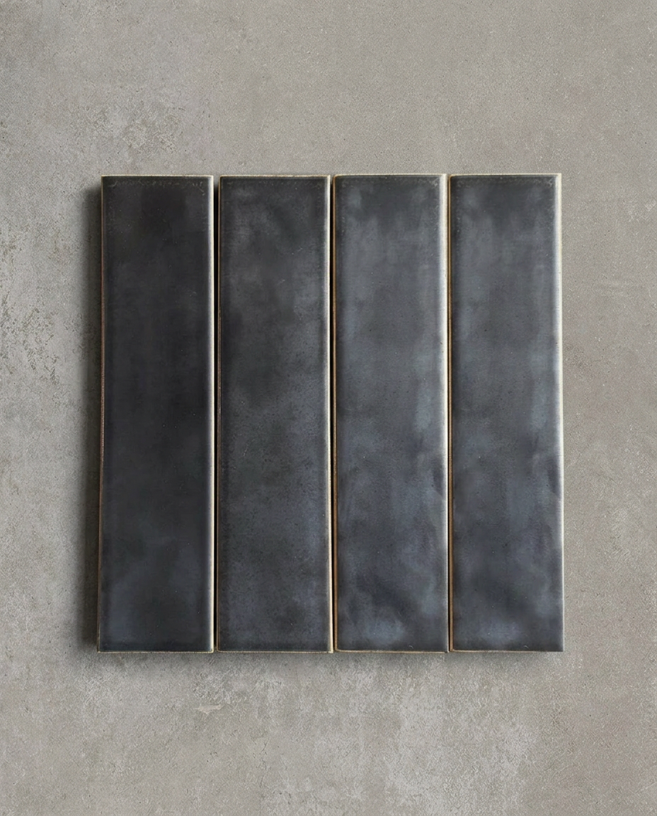 REZĀ is a handcrafted Japanese ceramic wall tile with a soft leather-like texture and richly nuanced glaze, bringing warmth, depth, and understated luxury to contemporary interiors.