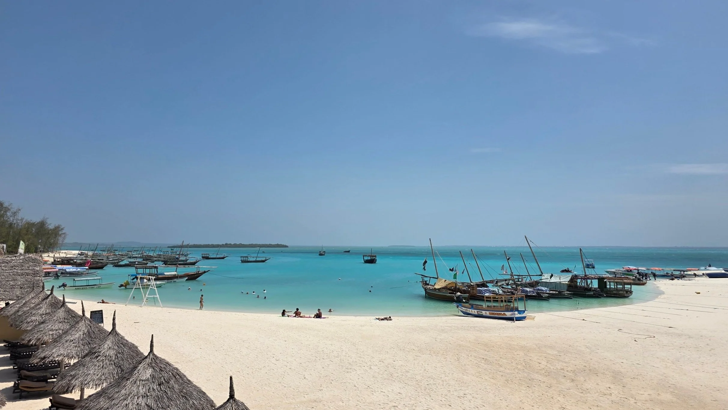 Kendwa Beach showing boats, sandbeds, and golden sand