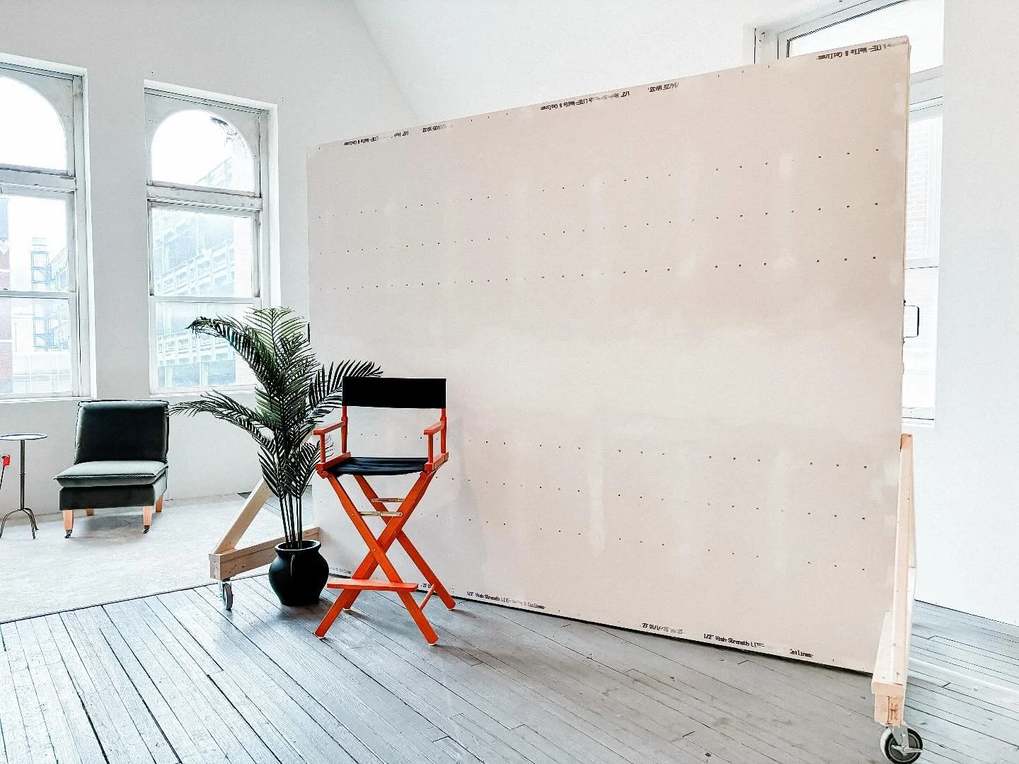 The newest addition to our 3rd floor loft 🙌🏼 One side will be black, but what would you like the other side to be painted? It&rsquo;s a gorgeous rolling 10x8 wall thanks to @tylerstevanus 🤍