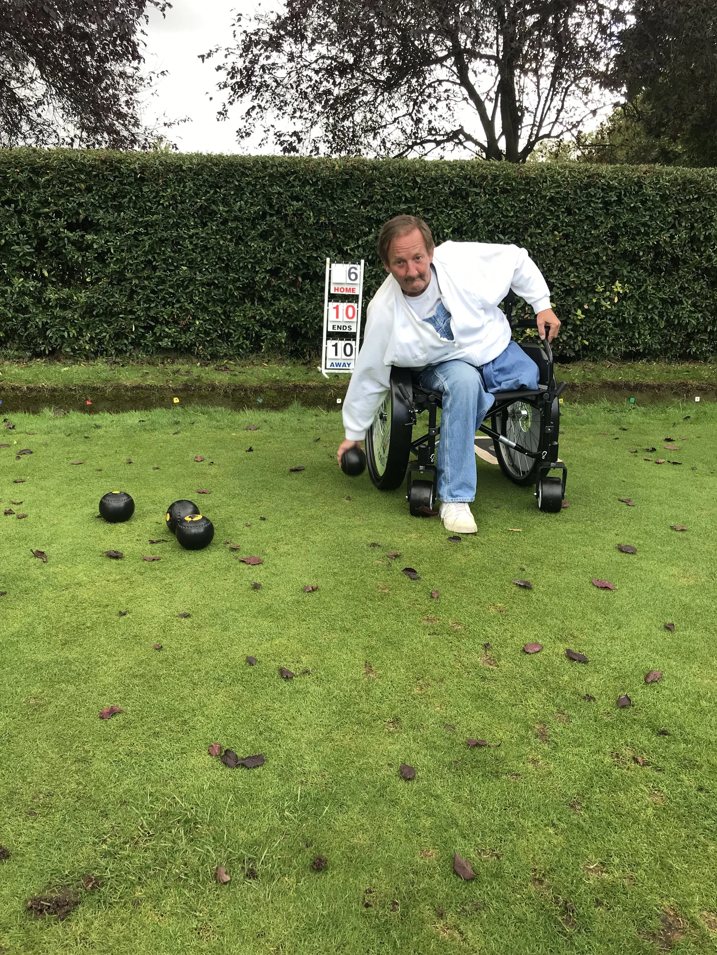 Paul using Victoria Park Bowls Club's wheelchair