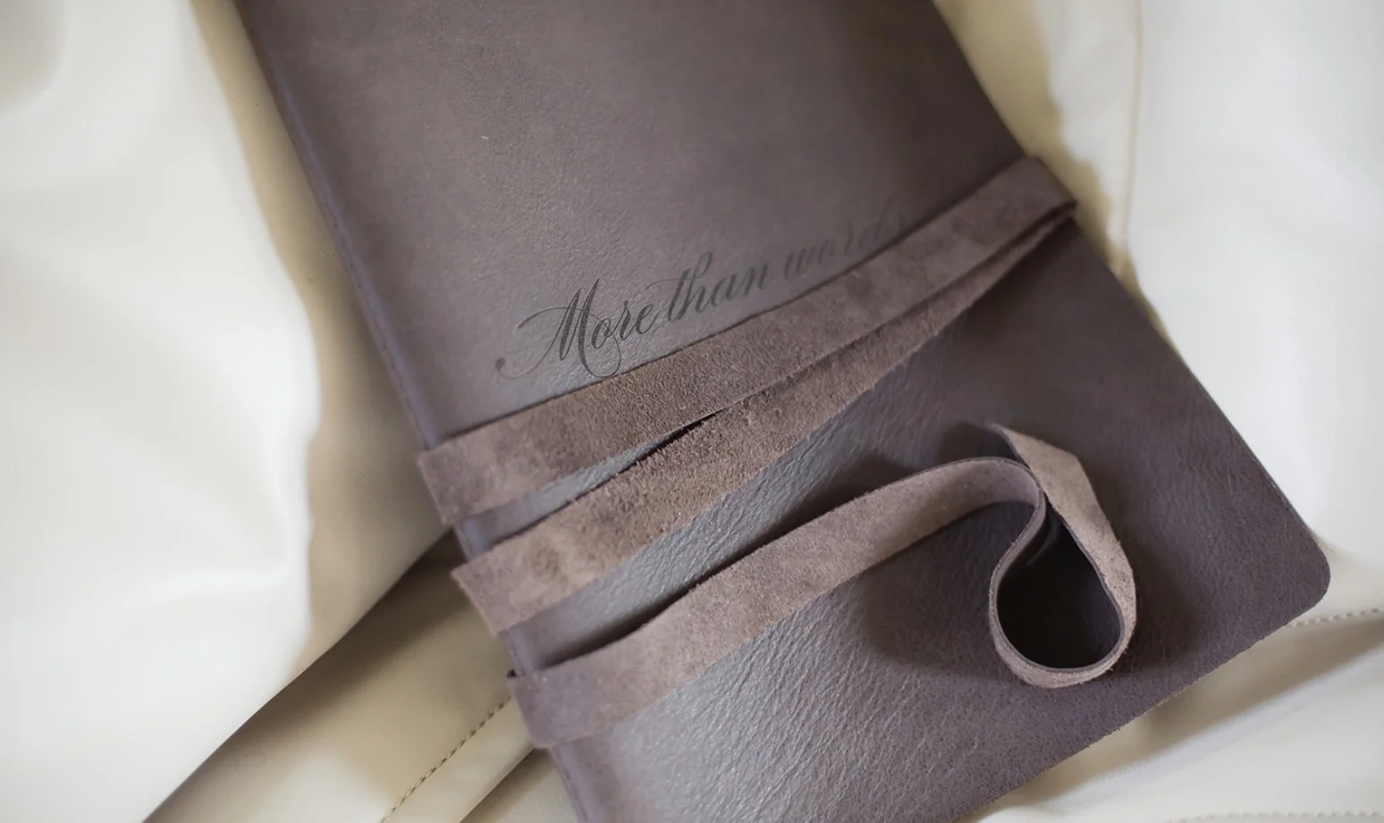 Custom leather book by Graphi Studio for Beauclair Photography
