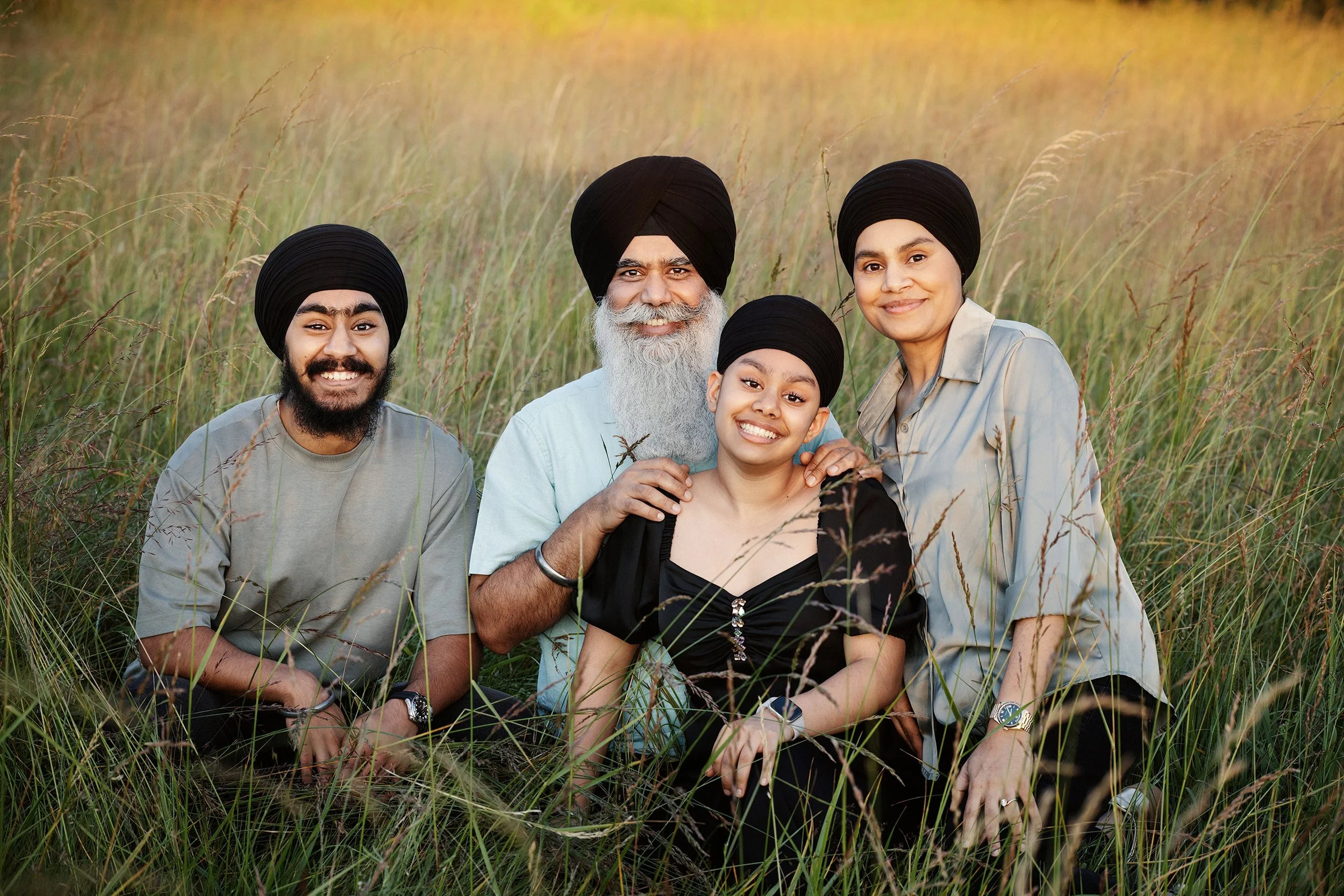 Discovery Park Family Portraits by Beauclair Photography in Kirkland.  Tall Grass with 4 person family.