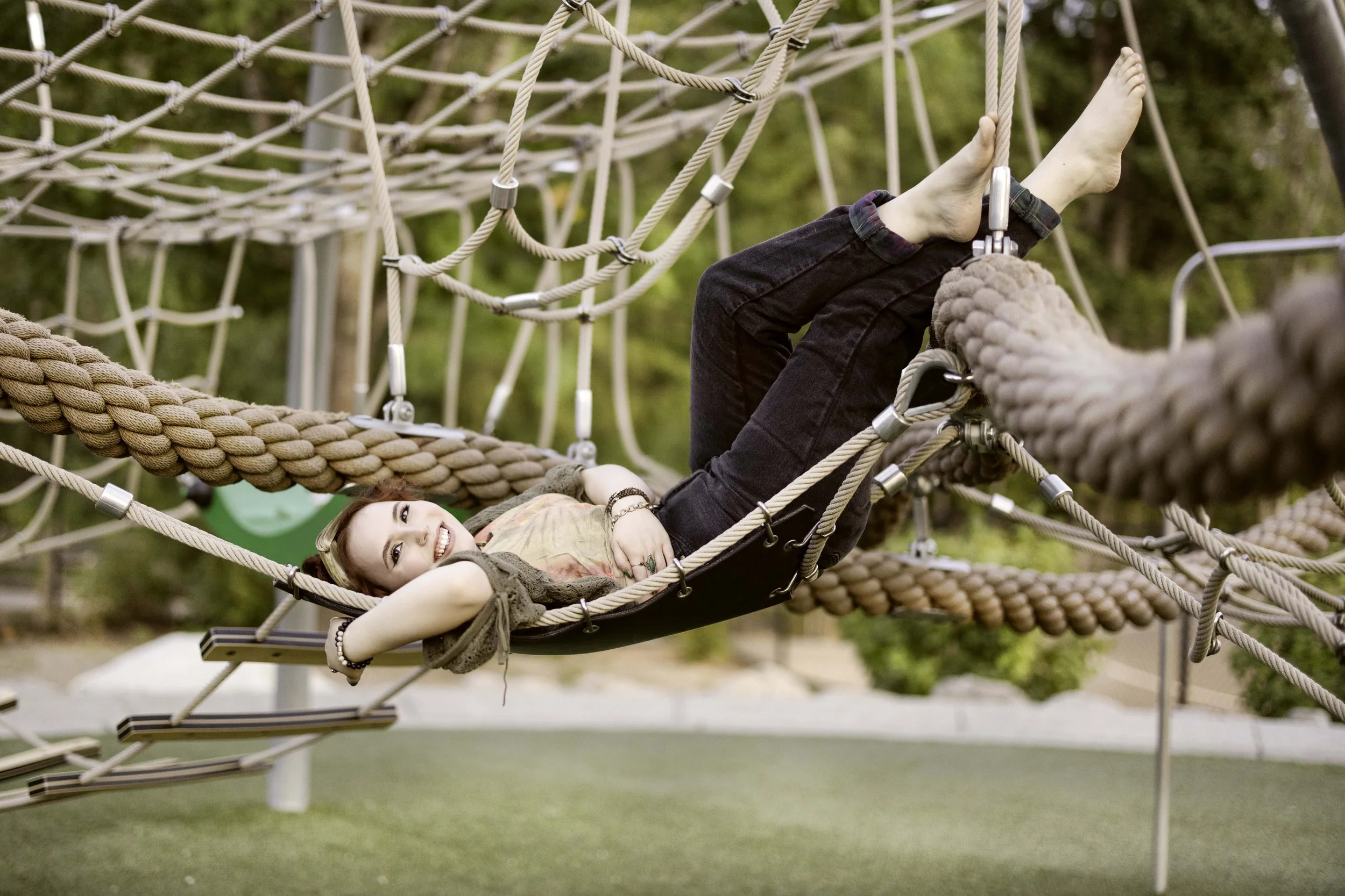 Senior high school portraits of girl in Bellevue park playground