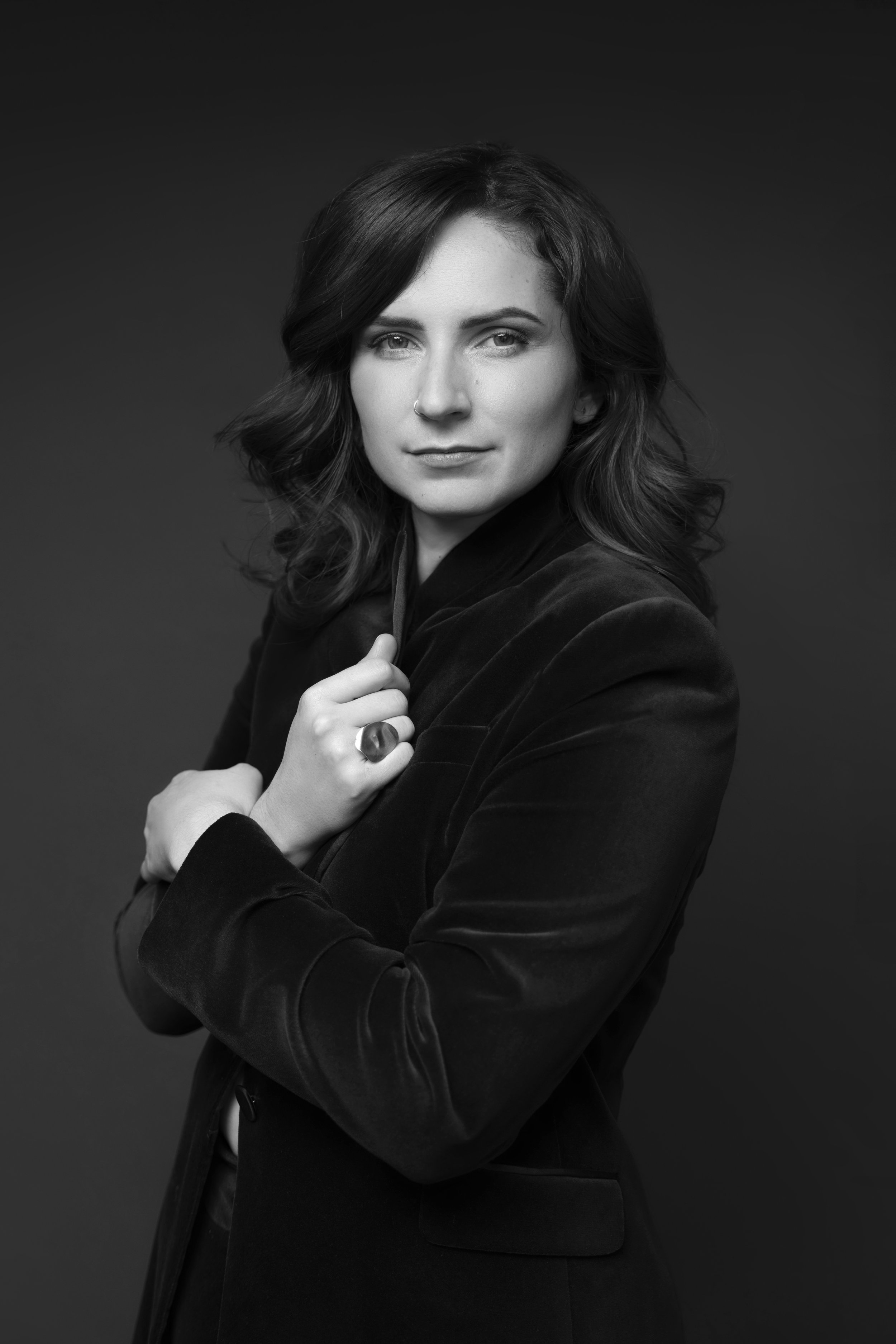  Executive headshot and branding photo of woman in pantsuit by Shannon Beauclair 