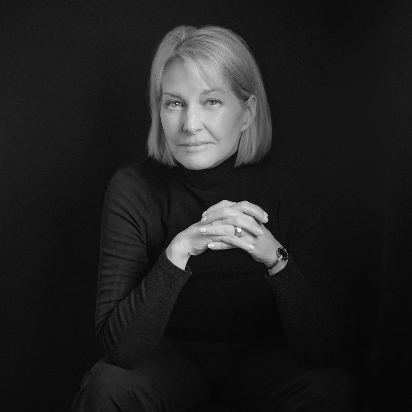 Black and white image of woman with blonde hair taken in Beauclair Photography portrait studio in Kirkland, serving Seattle and the Eastside.