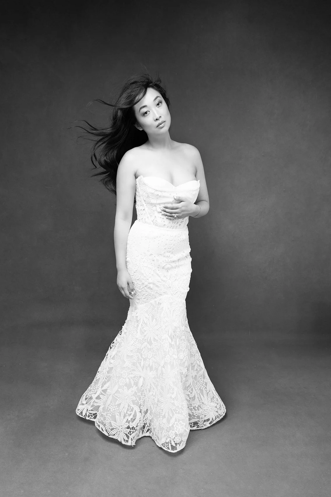 Wedding portrait of woman in her bridal dress.  Bridal portrait in fine art style of bride.