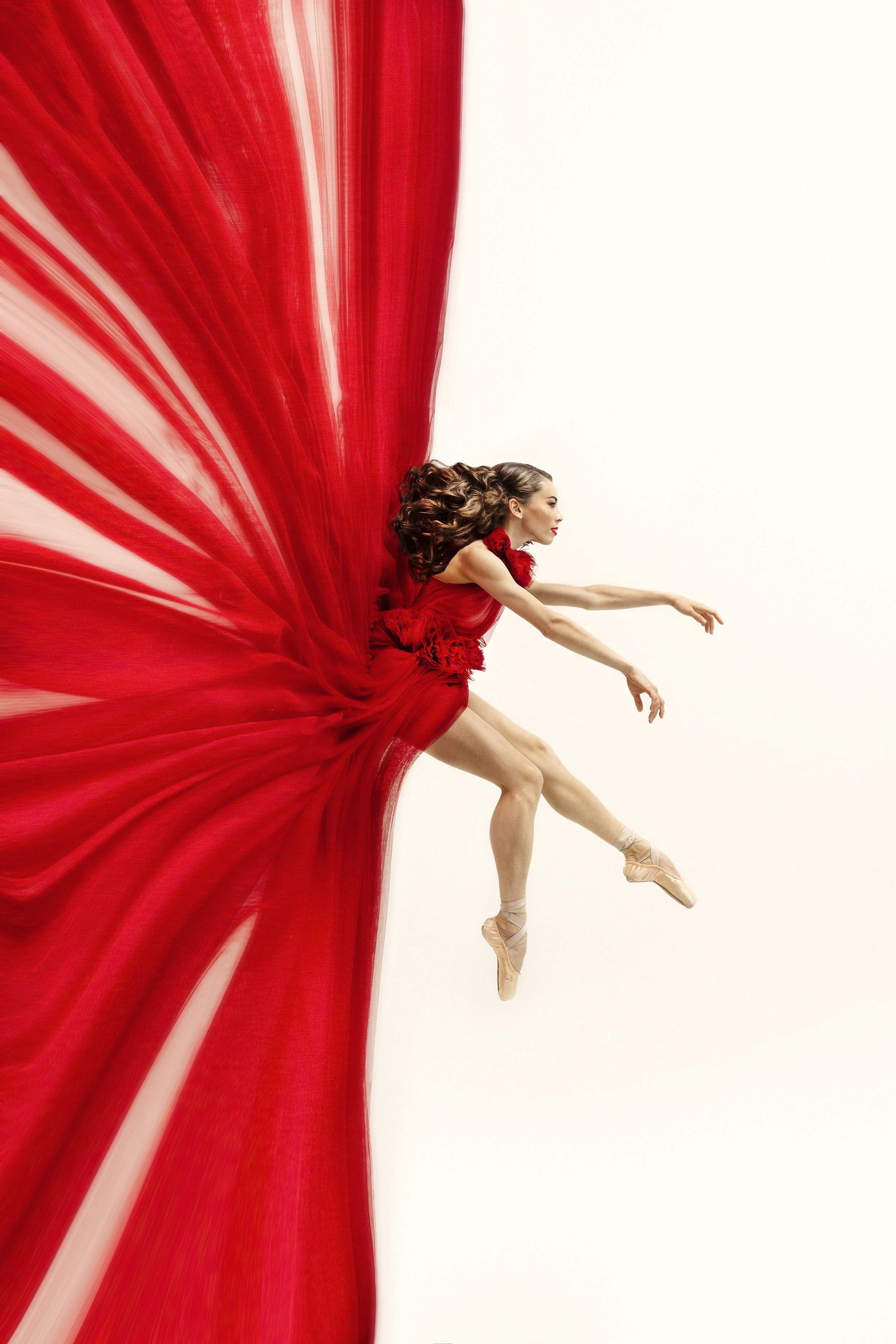 Woman posing in air during Dance Photo Session with Beauclair Photography