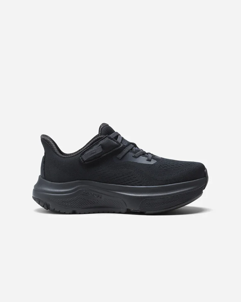 Black athletic sneaker with velcro strap and lace-up closure, set against a plain white background.