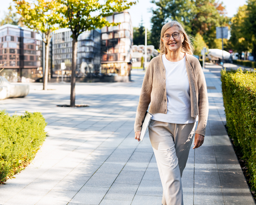 woman walking down a city street