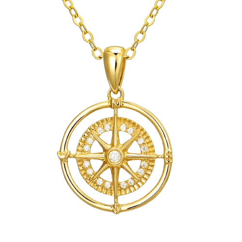 Pendentif en or en forme de roue de gouvernail avec des diamants, suspendu à une chaîne en or.