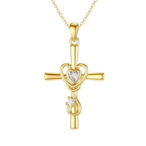Collier en or avec une pendentif en forme de croix et un cœur orné de diamant au centre.