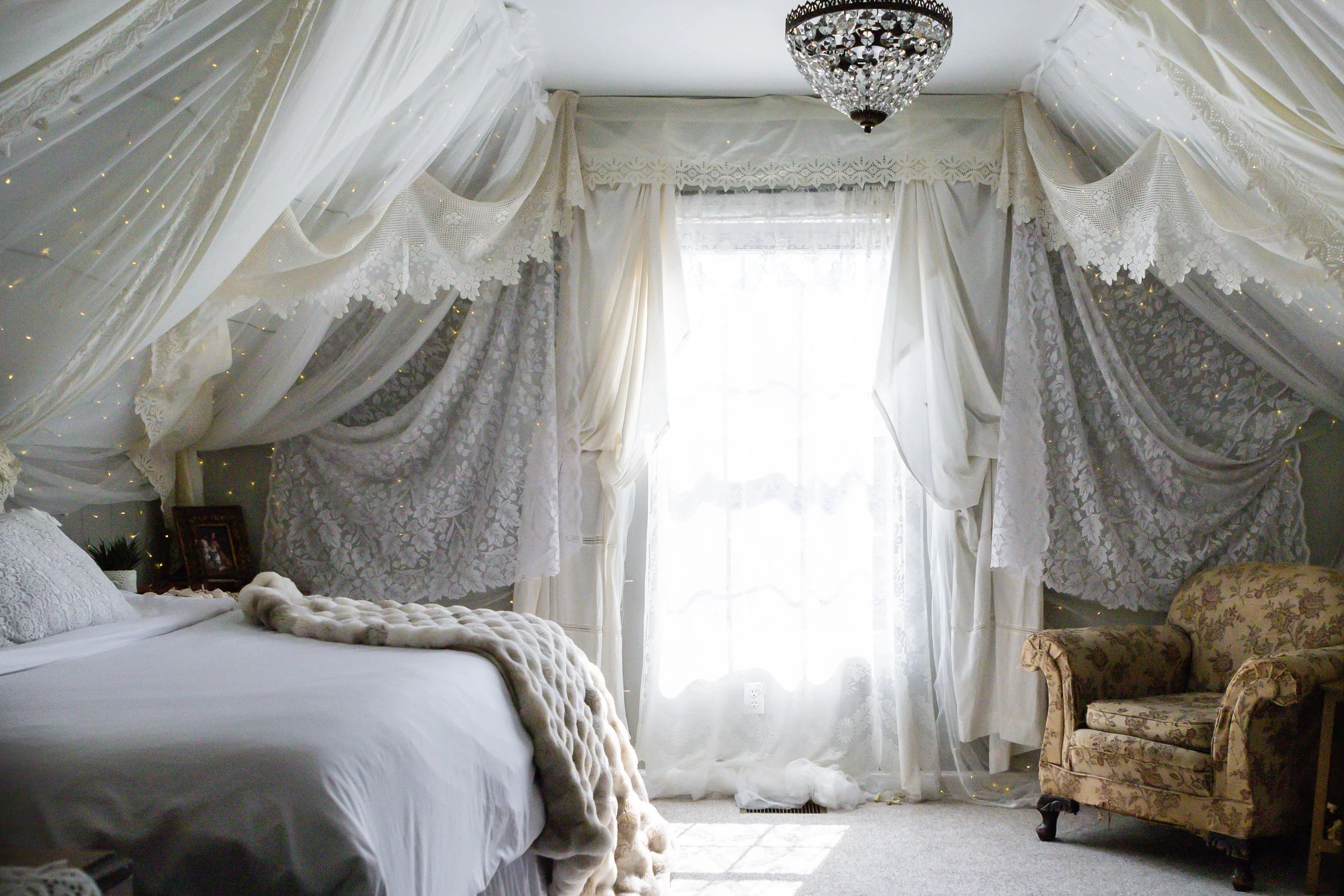 If you have ever wanted a magical lace fort with twinkle lights, this will make your dreams come true. Fall into the queen bed, or lounge in grandma’s chair and dream away.