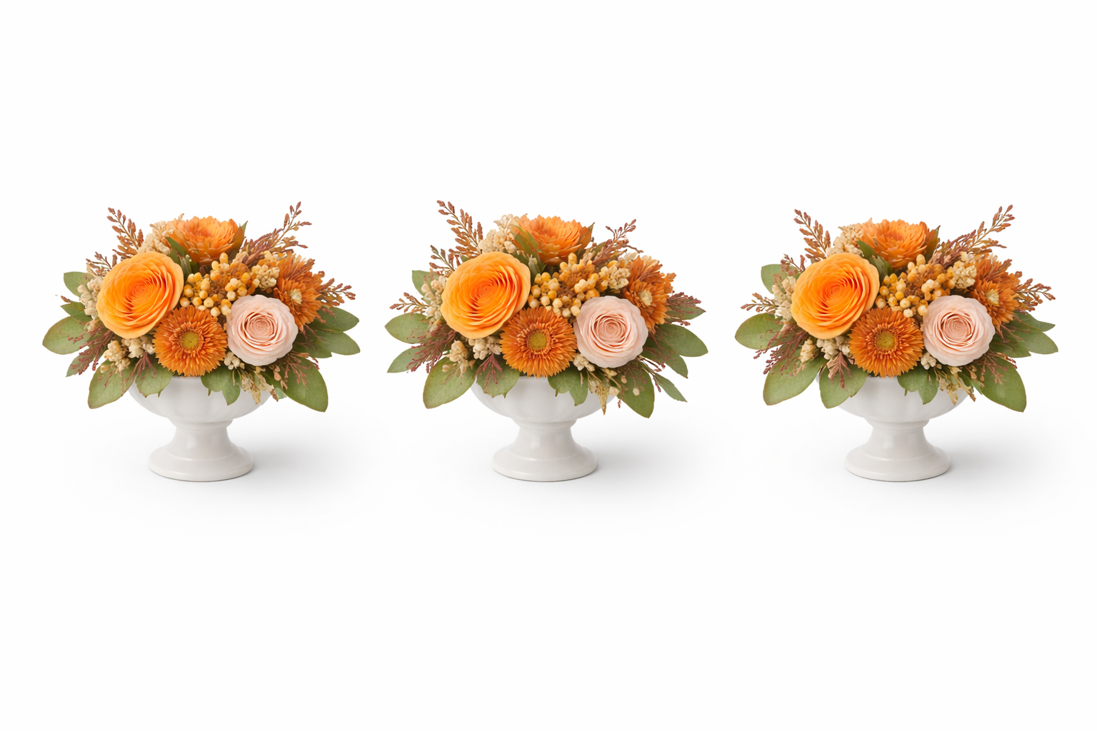 Floral trio in white ceramic vases.png