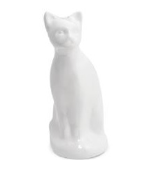 White porcelain cat figurine on a white background.