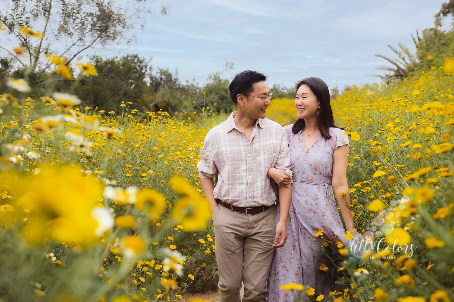Should you book a Signature Session or a Regular Session for my family’s photos with the wildflowers this year?